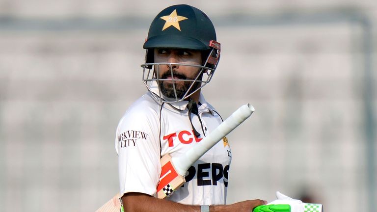 Pakistan's Babar Azam reacts as he walks off the field after his dismissal during the fourth day of the first test cricket match between Pakistan and England, in Multan, Pakistan, Thursday, Oct. 10, 2024. (AP Photo/Anjum Naveed)