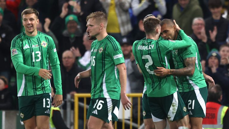 Josh Magennis celebrates scoring Northern Ireland's fifth