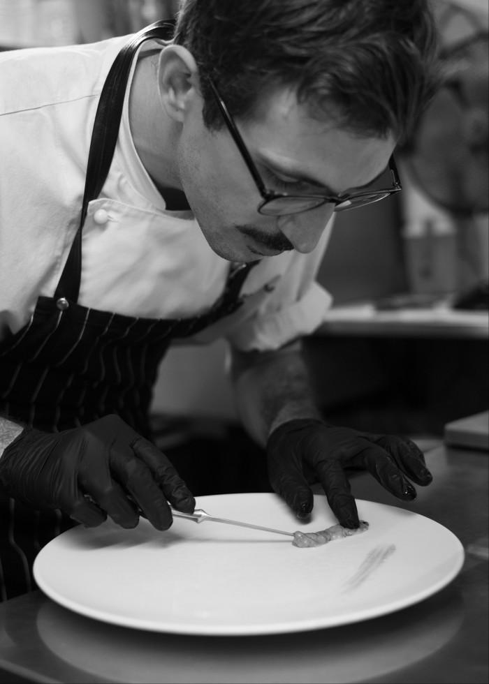  Lorenzo Benelli of Al Covo preparing a dish