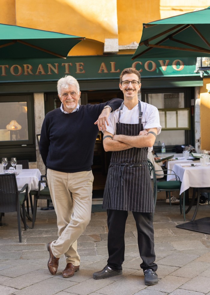 Cesare and Lorenzo Benelli outside their restaurant