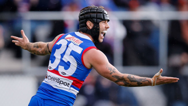 Caleb Daniel of the Bulldogs celebrates a goal.