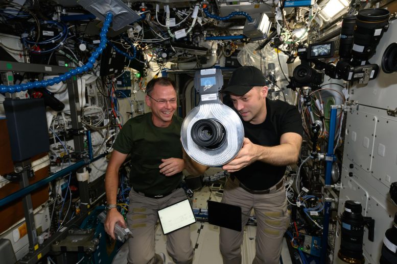 Astronauts Nick Hague and Matthew Dominick Check Out Camera Gear