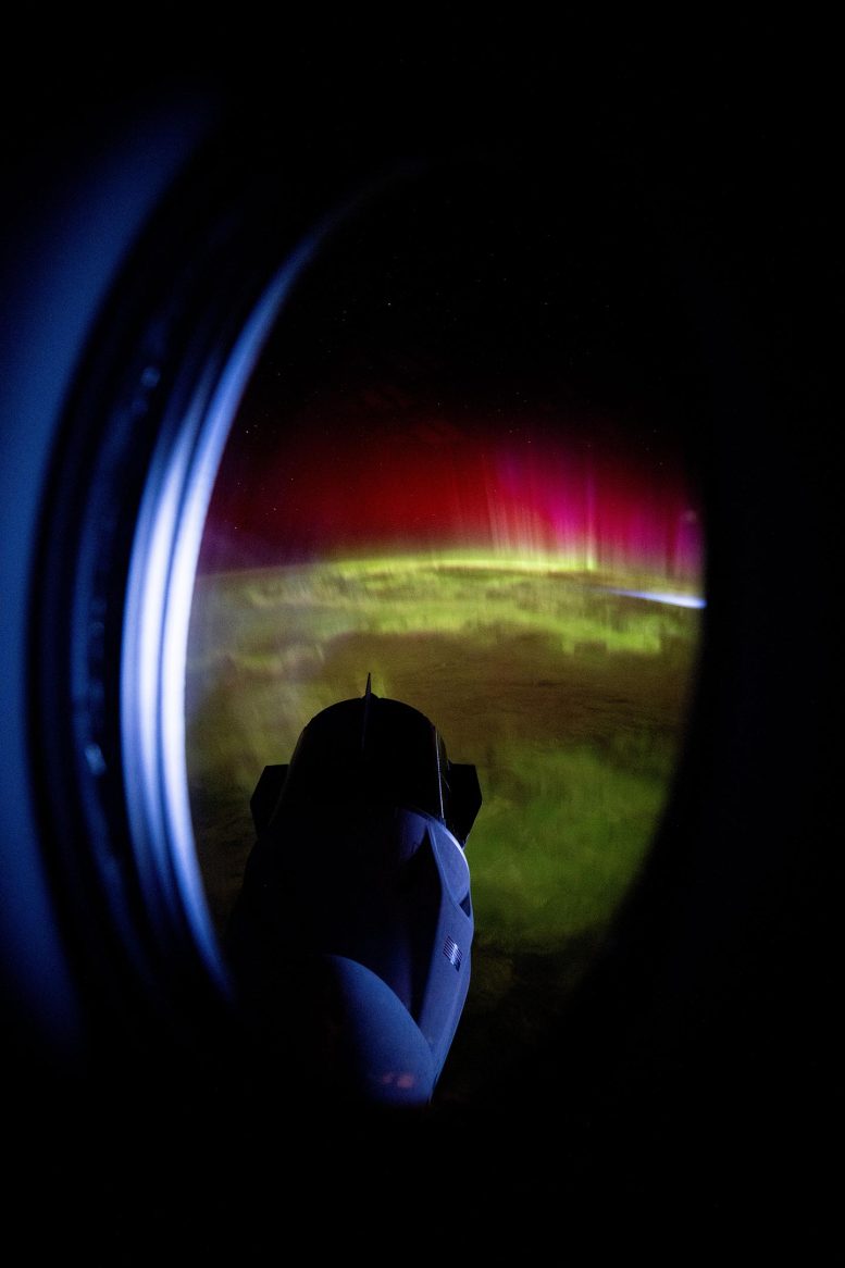 SpaceX Dragon Freedom Spacecraft at ISS As Auroras Move Through Earth’s Atmosphere