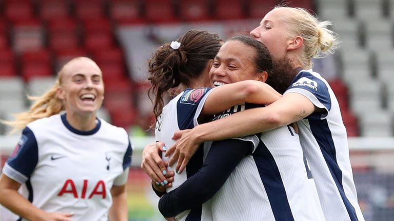 Hayley Raso is mobbed by her team-mates after opening the scoring for Spurs against Crystal Palace