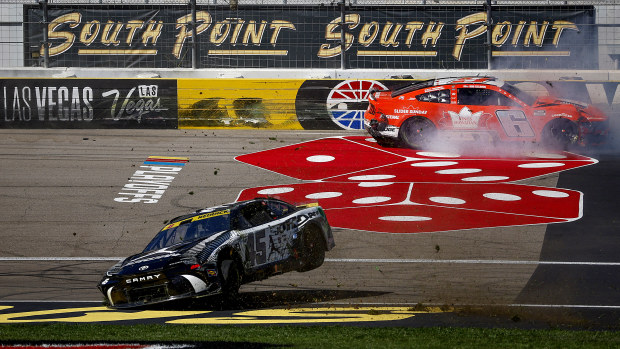 Tyler Reddick, driver of the #45 Jordan Brand Toyota, and Brad Keselowski, driver of the #6 King's Hawaiian Ford, spin after an on-track incident during the NASCAR Cup Series South Point 400 at Las Vegas Motor Speedway on October 20, 2024 in Las Vegas, Nevada. (Photo by Sean Gardner/Getty Images)