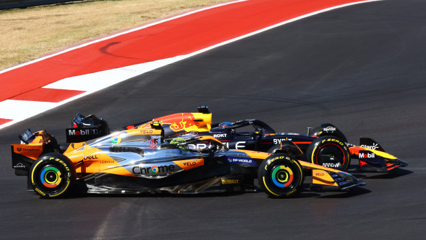 Max Verstappen of the Netherlands driving the (1) Oracle Red Bull Racing RB20 and Lando Norris of Great Britain driving the (4) McLaren MCL38 Mercedes battle for position during the F1 Grand Prix of United States at Circuit of The Americas on October 20, 2024 in Austin, Texas. (Photo by Mark Thompson/Getty Images)