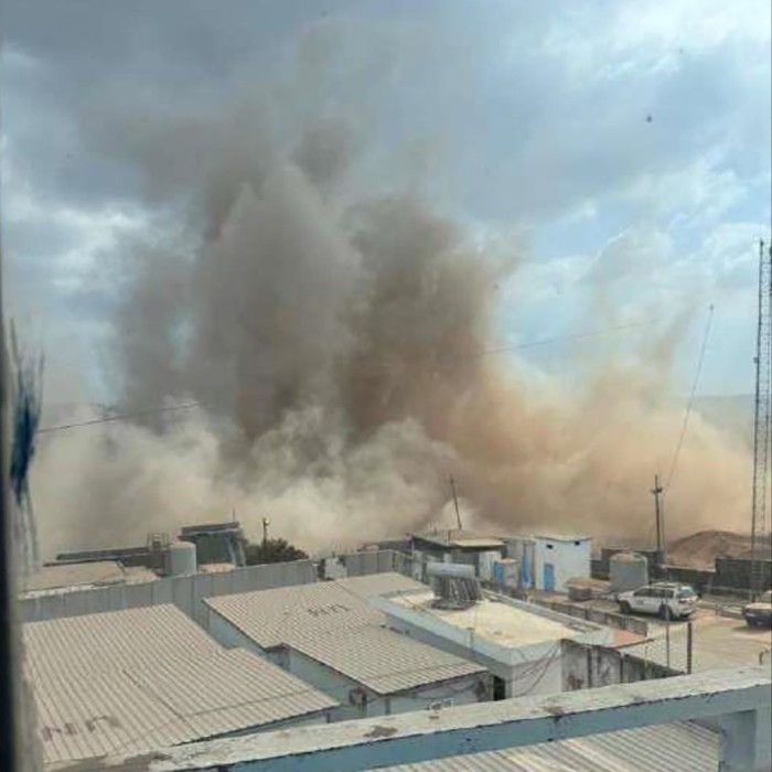 Photo of dust clouds following an explosion on October 10 2024, included in a confidential report