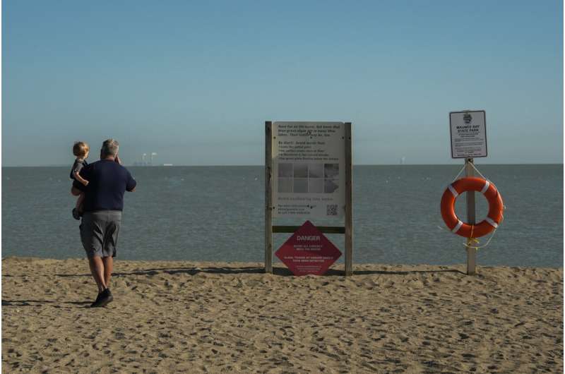 Researchers in a lab near Lake Erie study how toxic algae can damage health