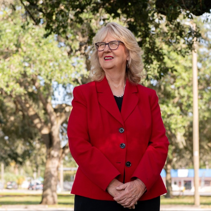 Susan MacManus, who is a political analyst, poses for a portrait outside of the Lutz Branch Library in Lutz