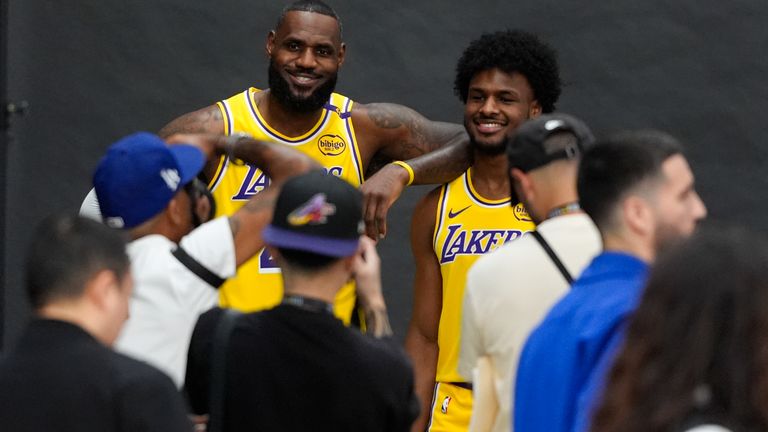 Los Angeles Lakers&#39; LeBron James, left, and his son, Bronny James, pose for photos during the NBA basketball team&#39;s media day in El Segundo, Calif., Monday, Sept. 30, 2024. (AP Photo/Jae C. Hong)