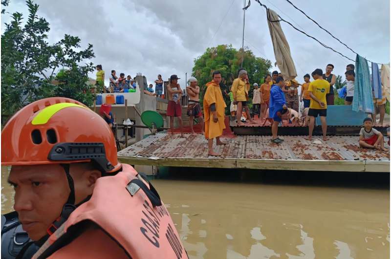 Torrential rain driven by the storm has turned streets into rivers, submerged entire villages and buried some vehicles in volcanic sediment