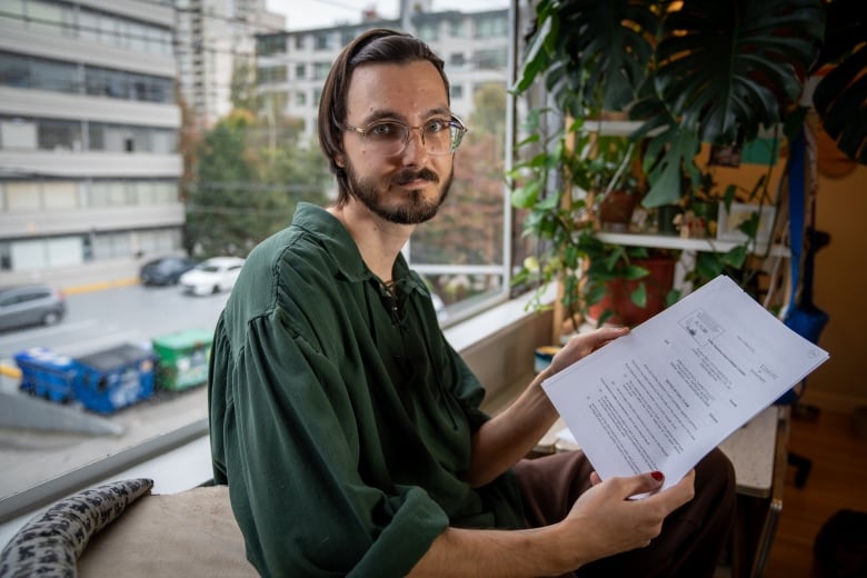 Image of Jonathan Petrov, one of a half dozen tenants at Vancouver building who are being sued by their landlord after they protested and flyered in downtown Vancouver.