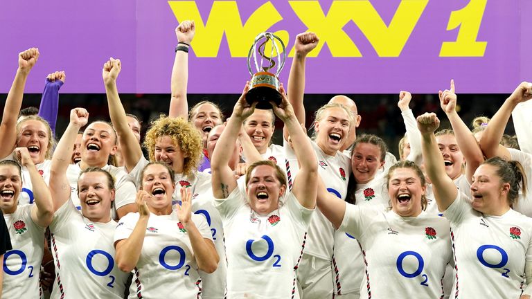 The Red Roses hold the WXV1 trophy aloft following victory over Canada