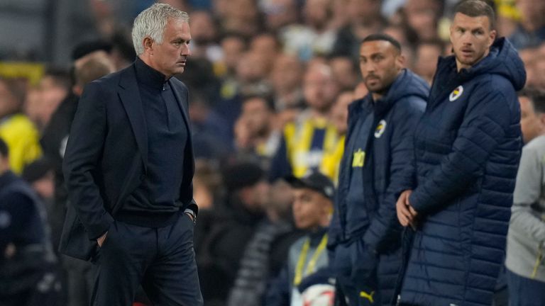 Fenerbahce head coach Jose Mourinho walks out of the pitch after being shown a red card during the Europa League opening phase soccer match between Fenerbahce and Manchester United at Sukru Saracoglu stadium, in Istanbul, Turkey, Thursday, Oct. 24, 2024. (AP Photo/Francisco Seco)