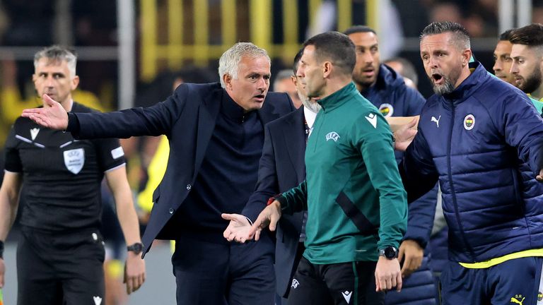 Jose Mourinho remonstrates with the fourth official before his red card during Fenerbahce's Europa LEague game against Manchester United