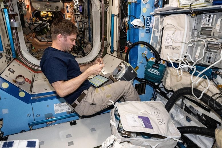 Astronaut Matthew Dominick Works on Ventilation Maintenance