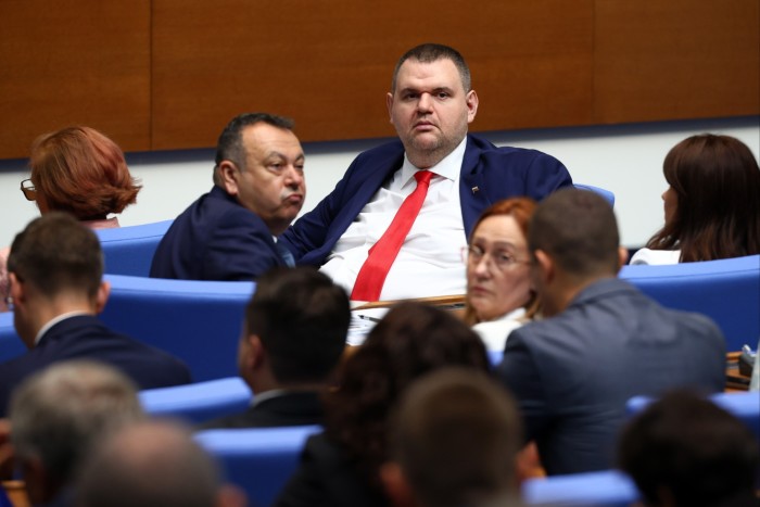 Delyan Peevski is seated among other attendees during a session of the National Assembly in Sofia