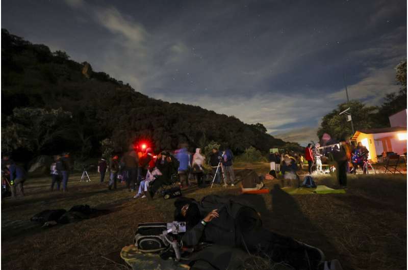 The dark sky over an urban park in central Mexico attracts stargazers who worry it might not last