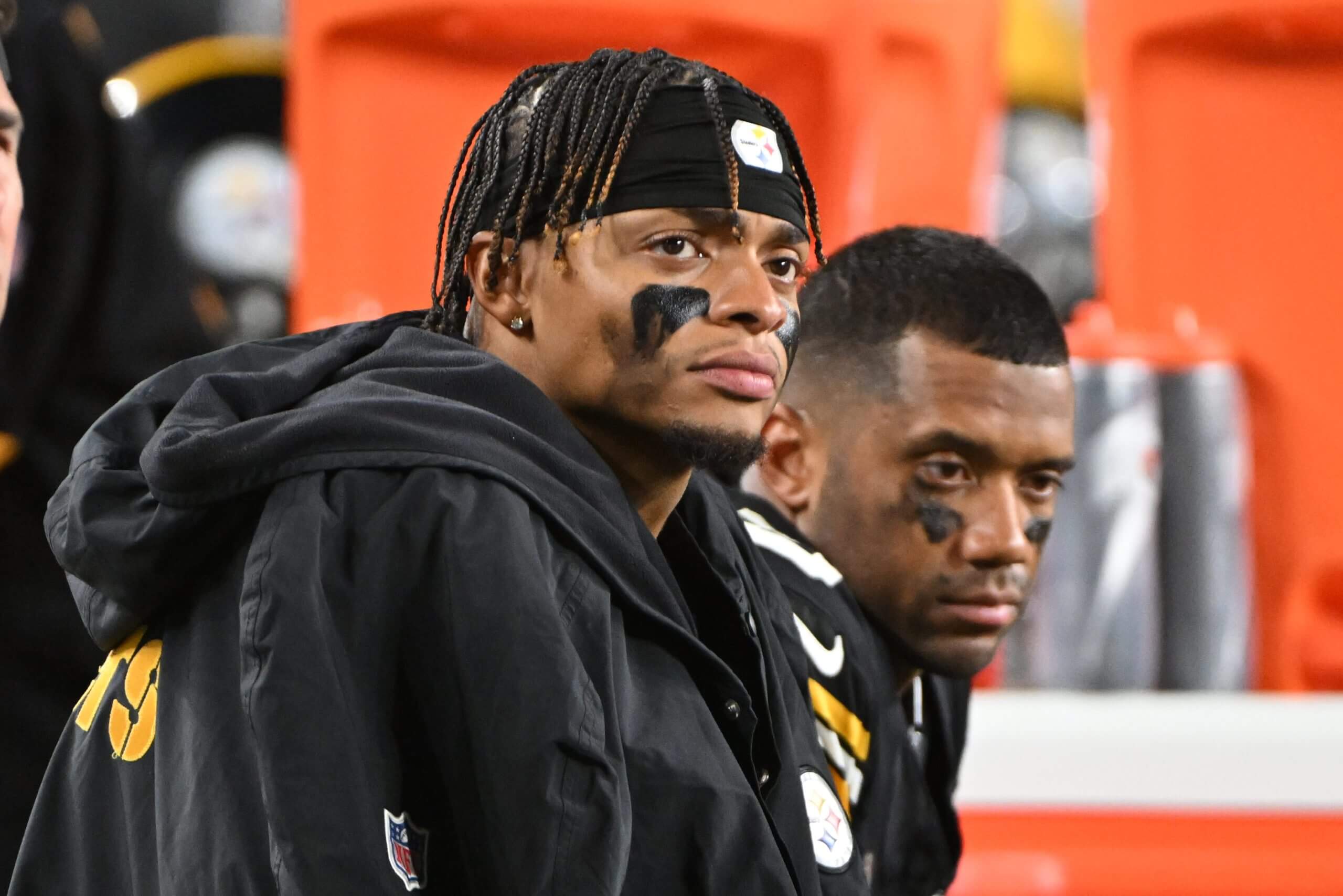 Pittsburgh Steelers quarterbacks Justin Fields and Russell Wilson watch the action against the New York Jets during the fourth quarter at Acrisure Stadium.