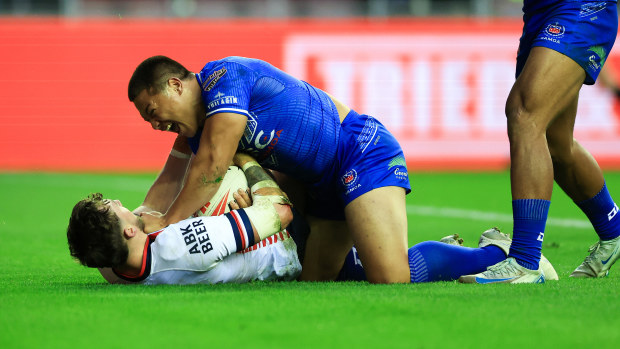 Gordon Chan Kum Tong of Samoa celebrates scoring his sides third try during the Autumn International Series test match between England and Samoa at Brick Community Stadium on October 27, 2024 in Wigan, England. (Photo by Jess Hornby/Getty Images)