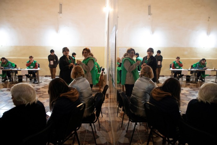 Election officials and observers at a polling station in Napareuli, in the region of Kakheti, Georgia, on Saturday