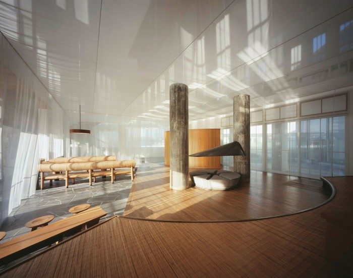 The Ex-Noguchi Room: a sun-dappled space with large cylindrical sculptures and columns  