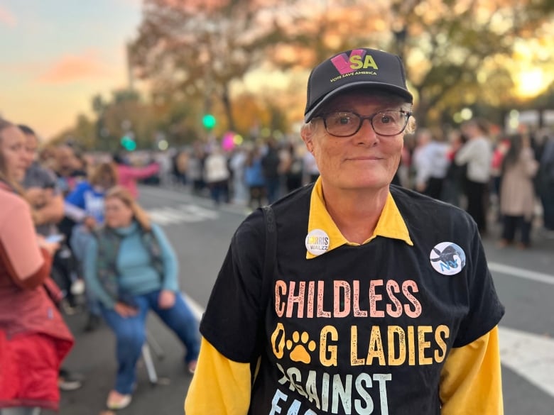 Woman with T shirt that says "Childless Dog Ladies"