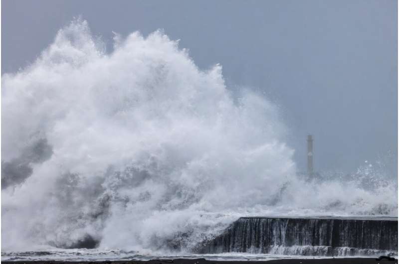 Strong waves break along Taiwan's northeastern coast Wednesday as Typhoon Kong-rey approaches