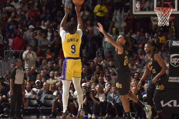 Bronny James of the Los Angeles Lakers shoots the ball during the game against the Cleveland Cavaliers.