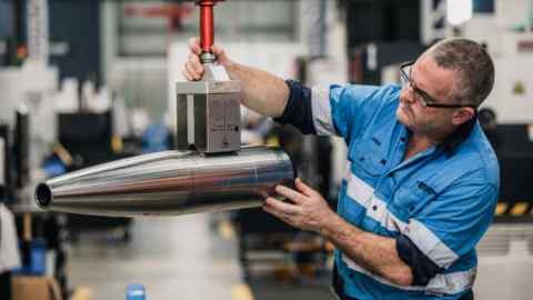 Man working on shell production