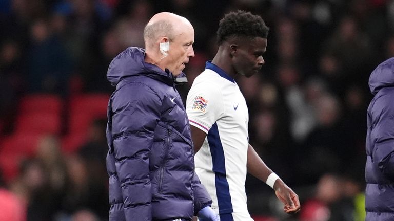 Bukayo Saka leaves the pitch after being injured playing for England against Greece