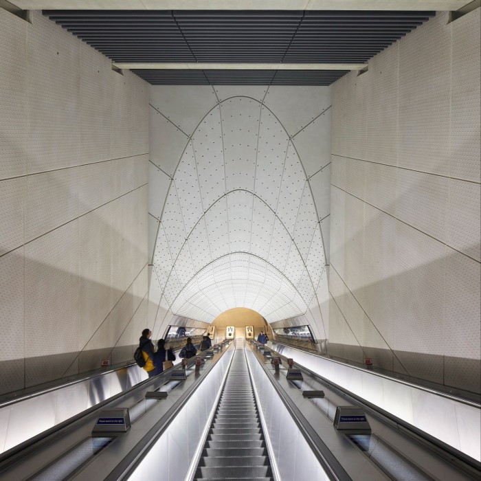 Passengers on an escalator