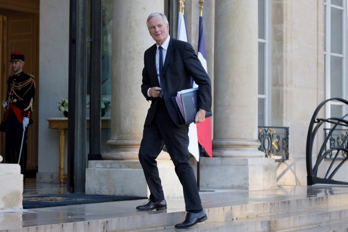 Michel Barnier outside the Élysées presidential palace in Paris on Thursday 