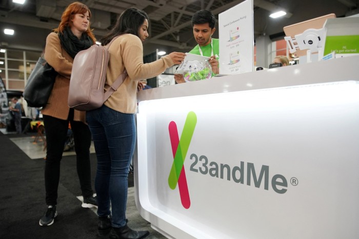 Attendees buy DNA kits at the 23andMe booth at the RootsTech annual genealogical event in Salt Lake City, Utah, US