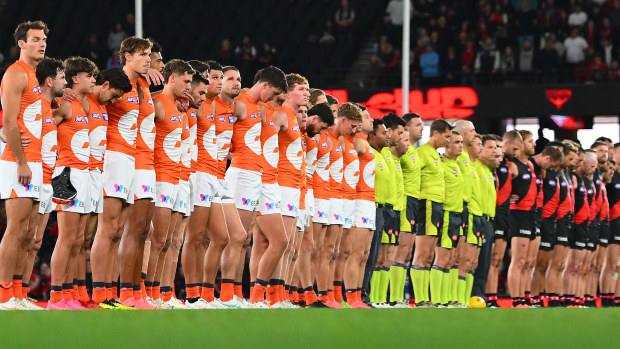 Giants and Bombers players paid tribute before the match.