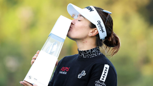 Hannah Green of Australia kisses the trophy after winning BMW Ladies Championship 2024.