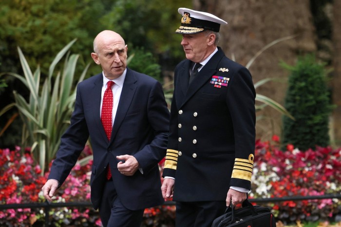 John Healey, left, with chief of the defence staff, Admiral Sir Tony Radakin