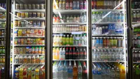 Bottles of drinks in a refrigerator at a Seven & i Holdings store in Matsudo, Japan