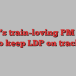 Japan’s train-loving PM fights to keep LDP on track