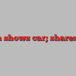 Man shows car; shares fall