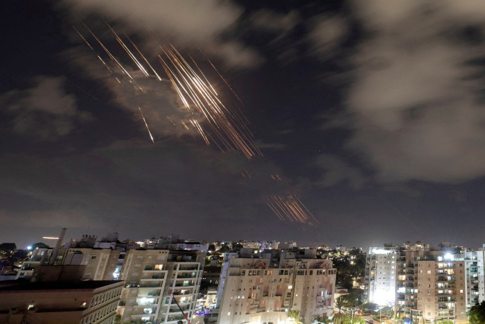 Israel’s Iron Dome anti-missile system intercepts rockets after Iran fired a salvo of ballistic missiles, as seen from Ashkelon, Israel