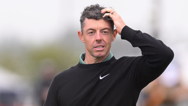 Rory McIlroy of Northern Ireland reacts on the 18th green on day one of The 152nd Open championship at Royal Troon on July 18, 2024 in Troon, Scotland. (Photo by Ross Kinnaird/Getty Images)