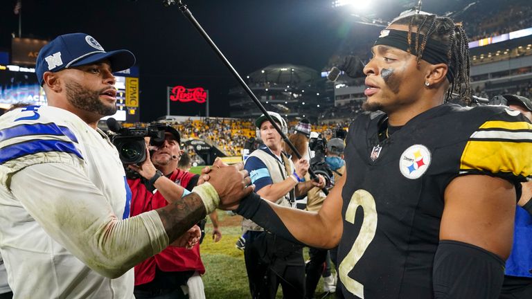 Dallas Cowboys quarterback Dak Prescott, left, talks with Pittsburgh Steelers quarterback Justin Fields following an NFL football game, early Monday, Oct. 7, 2024, in Pittsburgh. The Cowboys won 20-17. (AP Photo/Matt Freed)