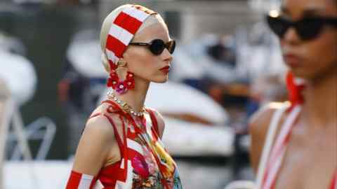 A model walks the runway at the Dolce & Gabbana X Mytheresa capsule presentation