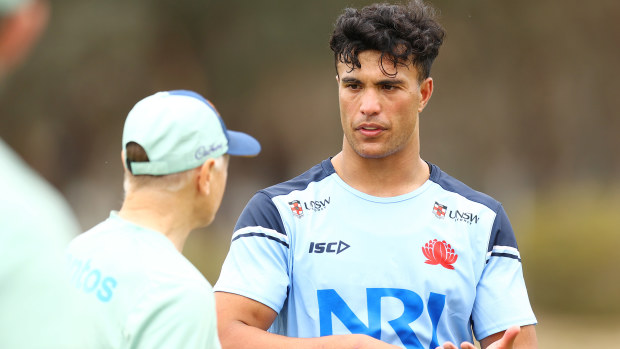 Joseph-Aukuso Suaalii talks to Wallabies coach Joe Schmidt at the AIS.