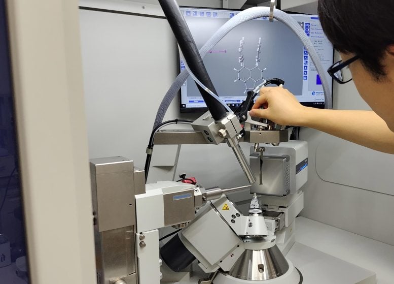 Researcher Using X-Ray Diffractor To Study Sigma Bond