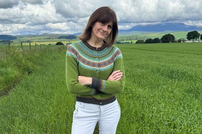 Helen Crawford  standing in a field