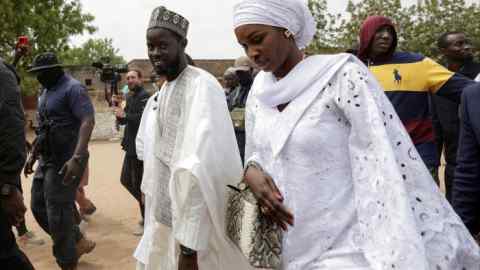 Bassirou Diomaye Faye after casting his vote at the polling station in his home village of Ndiaganiao