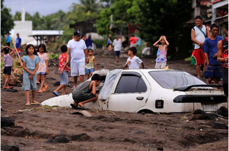 At least 32,000 people have fled their homes in the Philippines, as the storm edges closer to the main island of Luzon