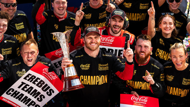 Brodie Kostecki celebrates winning the 2023 Supercars drivers' championship with his Erebus Motorsport team.